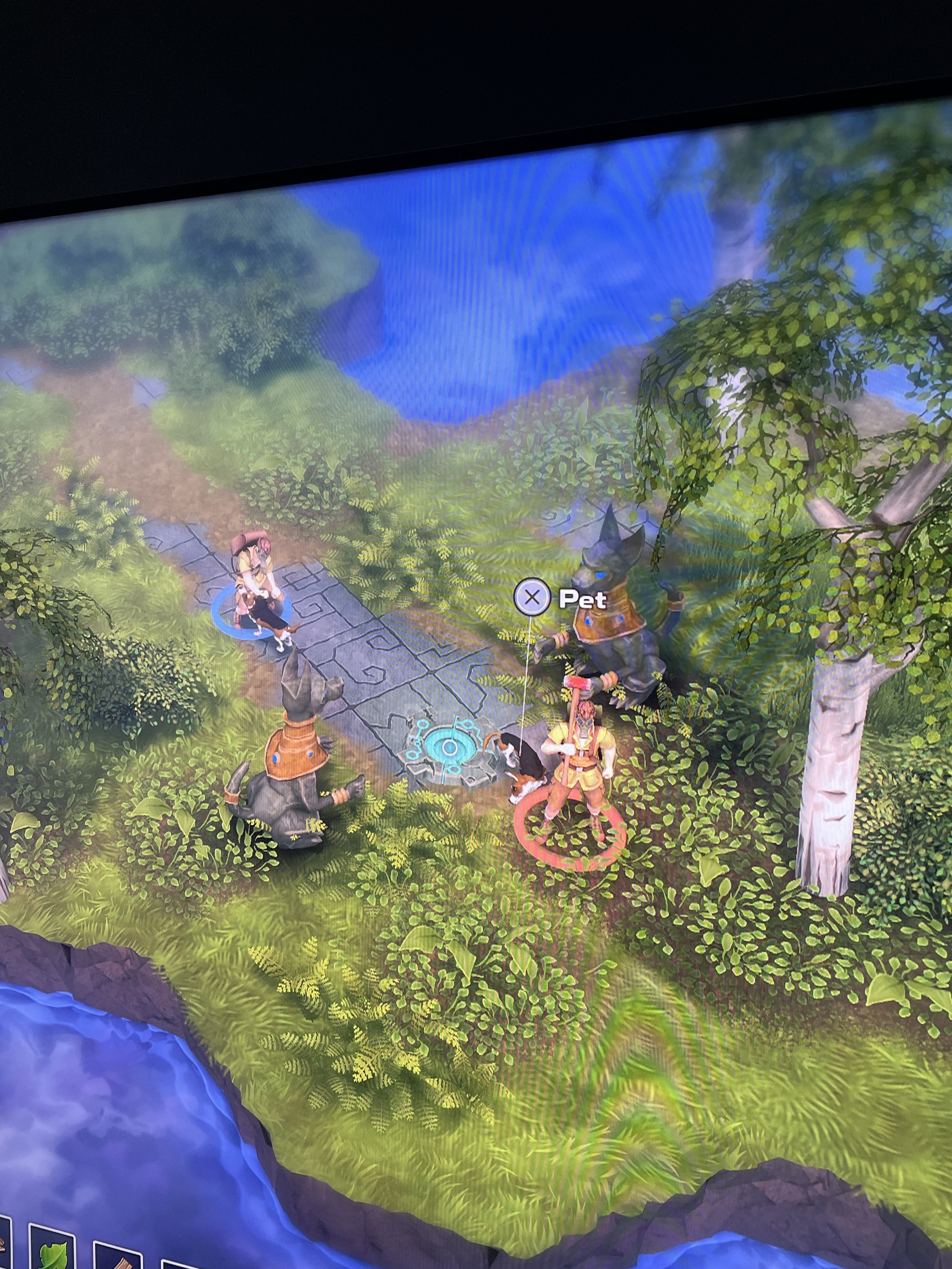 A photo of a screen during a game of Dysmantle. Two players each have a pet hound.  Press x to Pet.